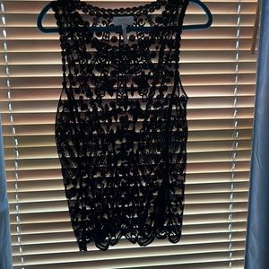 Laundry size s sheer lace tank. Wear a cami underneath.